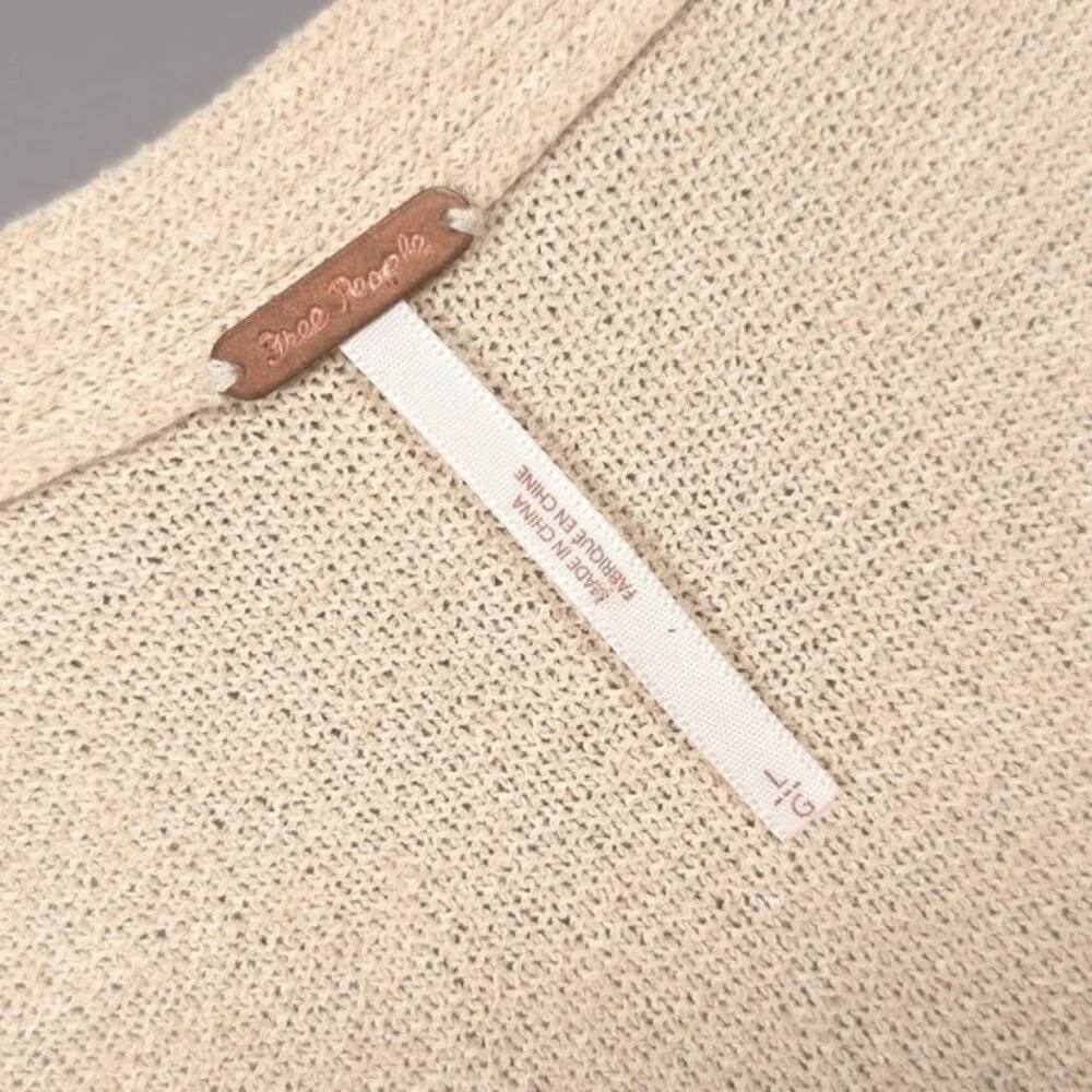 NWT Free People Size LARGE Criss Cross Tunic Sweater V Neck Side Slits Ivory‎